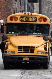 Man Charged After Jumping on Hood of School Bus