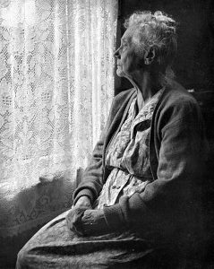 478px-Elderly_Woman_BW_image_by_Chalmers_Butterfield-239x300